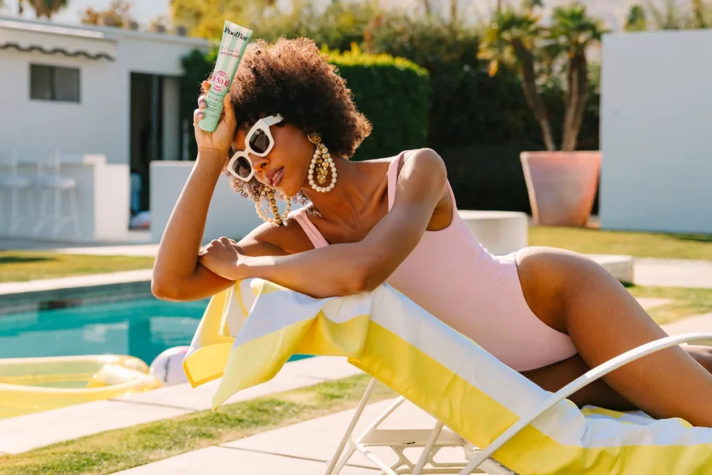 woman modelling with poolbar sunscreen