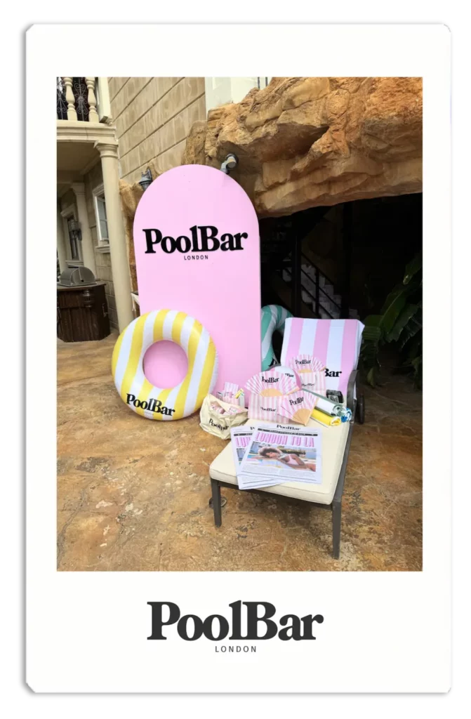 poolbar branded items including newspapers titled london to la polaroid