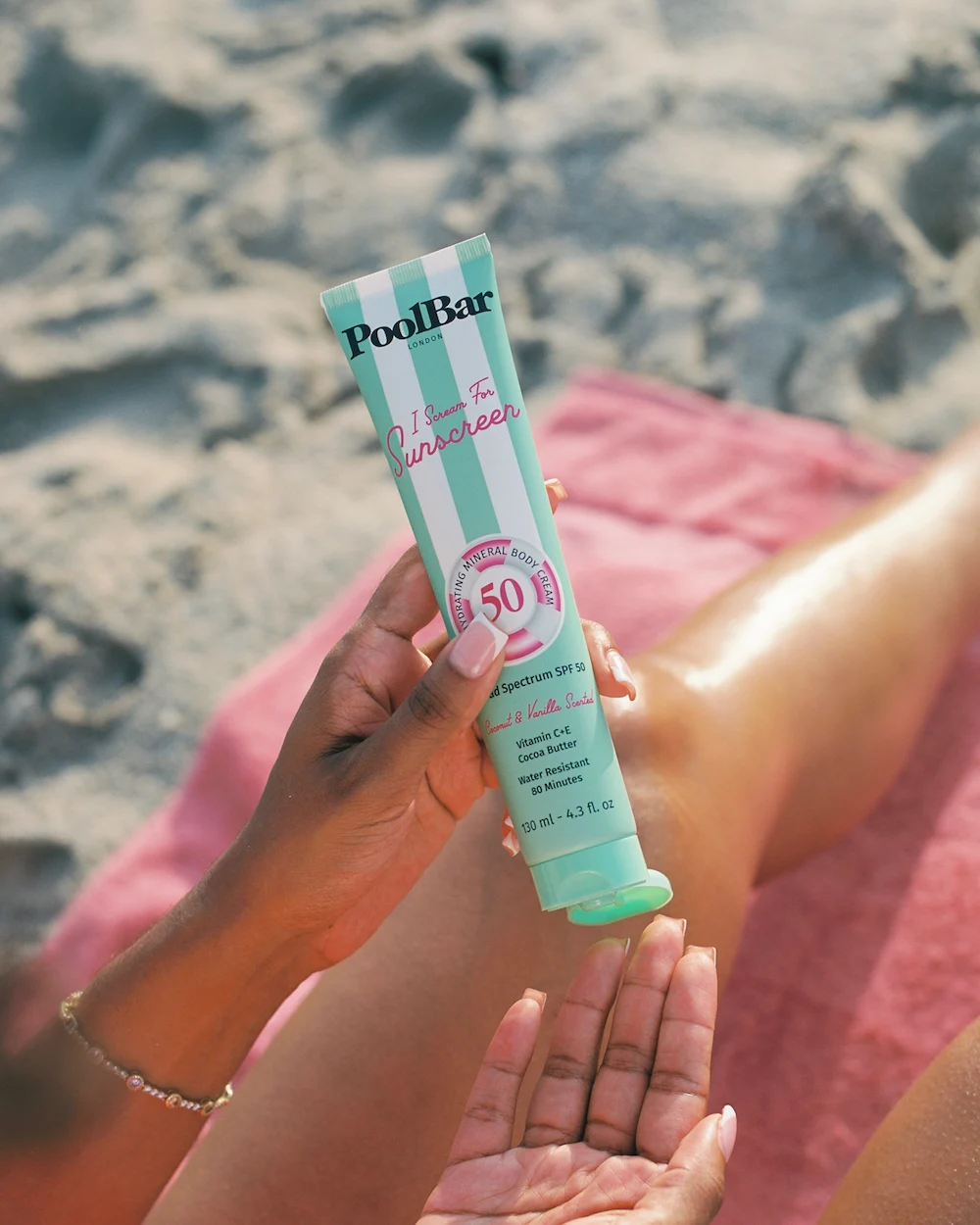 using poolbar spf 50 sunscreen at the beach